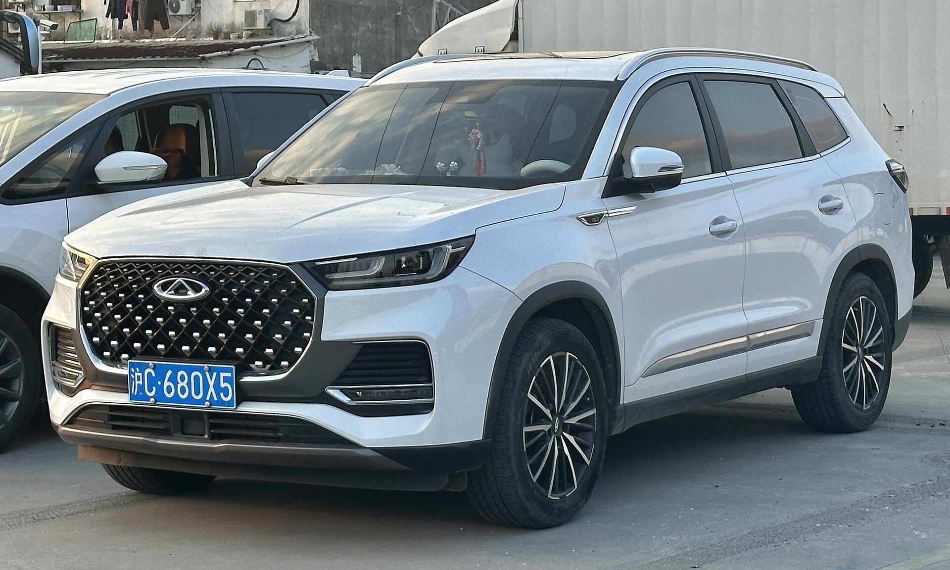 Photograph of the Chery TIGGO 8 used as a model-family reference