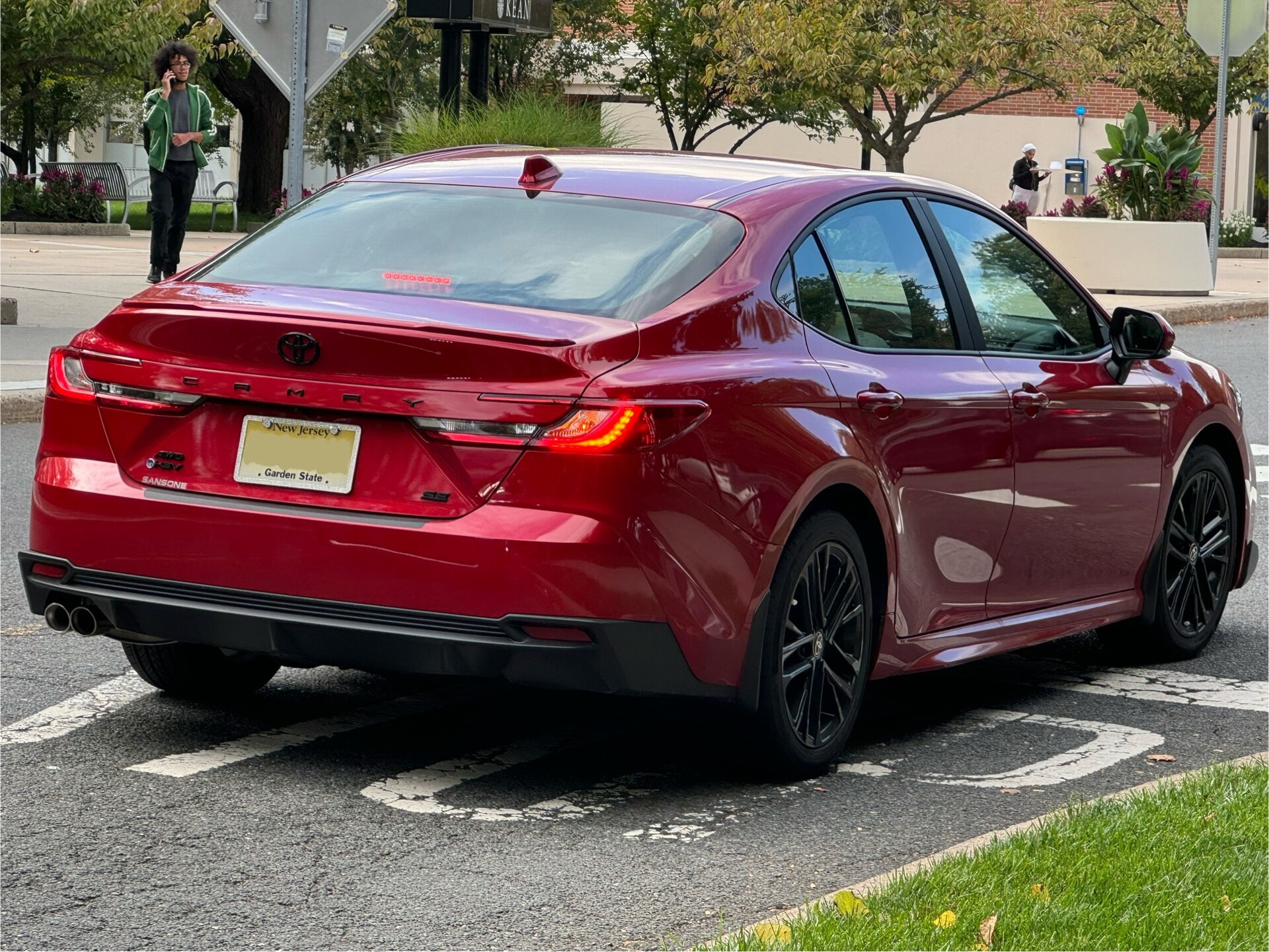 Official 2026 Toyota Camry sedan in a front three-quarter exterior view